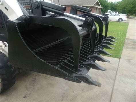 bobcat skid steer claw bucket|skid steer attachments.